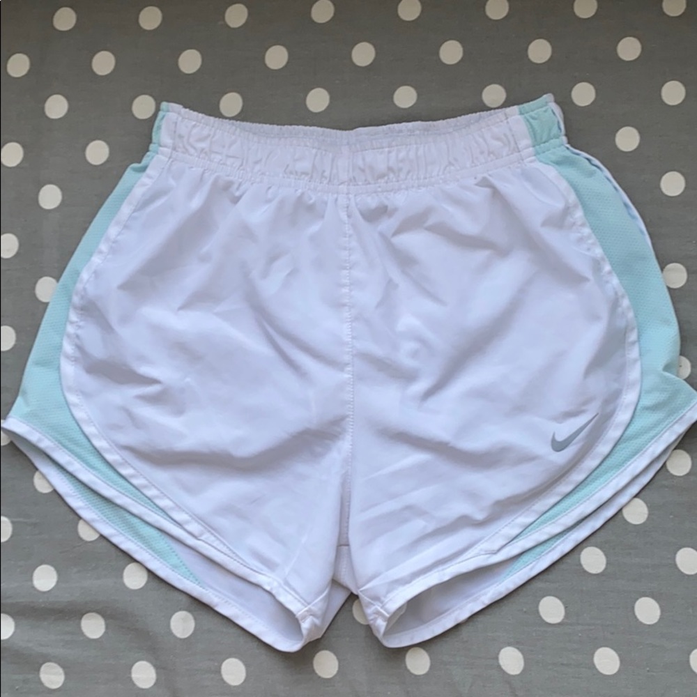 white and teal nike shorts